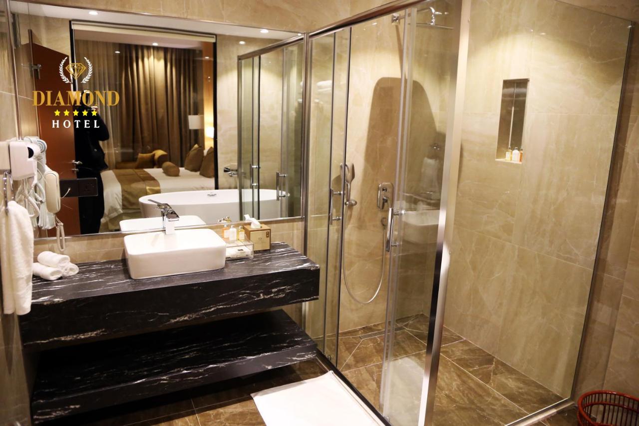 Hotel Diamond Prishtina Laplje Selo Exterior foto A bathroom at the hotel